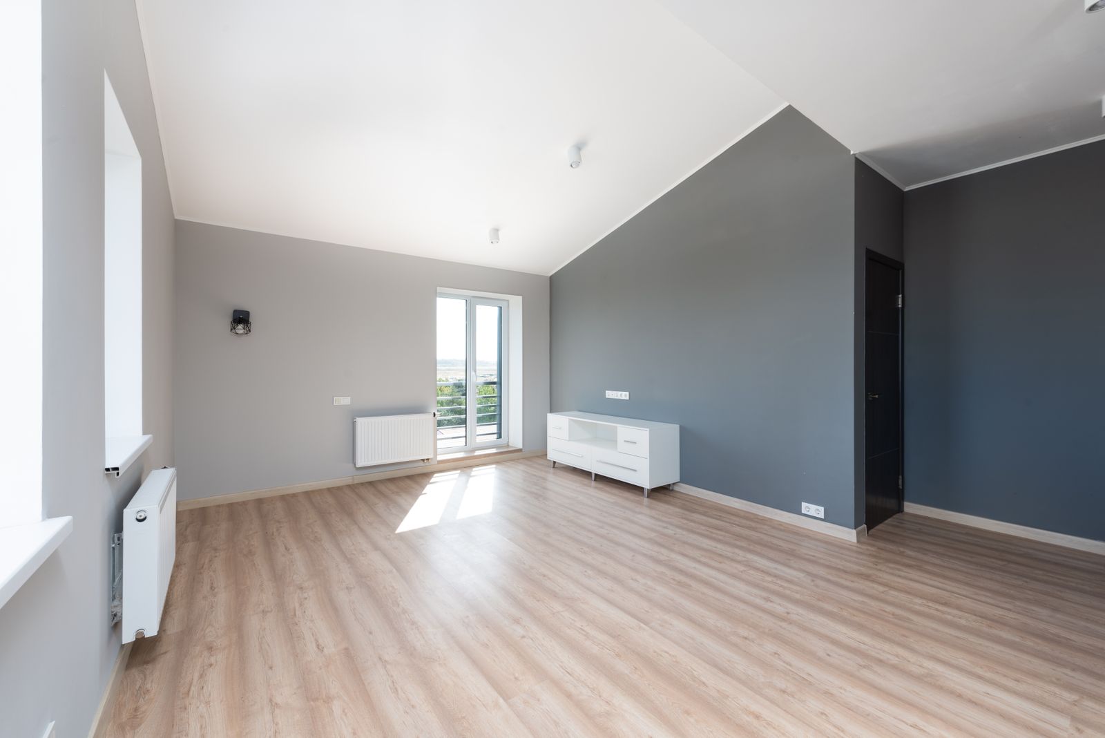 The same house after 22 feet of bearing wall was removed and one floor was run through